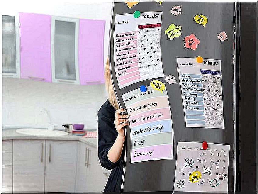 Woman opening refrigerator