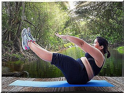 Overweight woman exercising