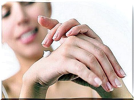 woman applying cream