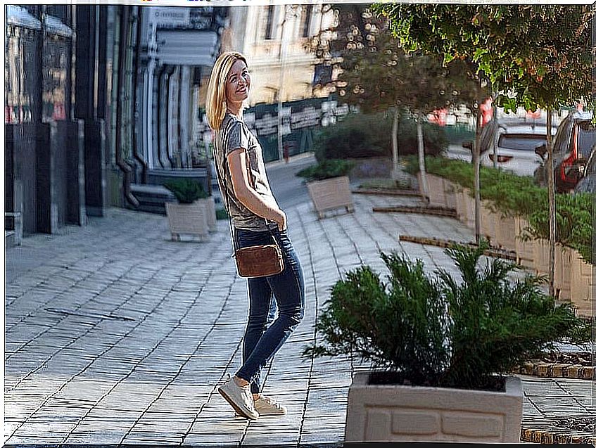 Woman walking on the street.