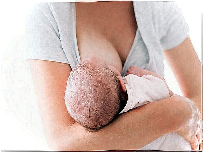 Woman breastfeeding her baby