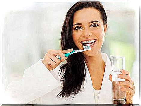 woman with toothbrush