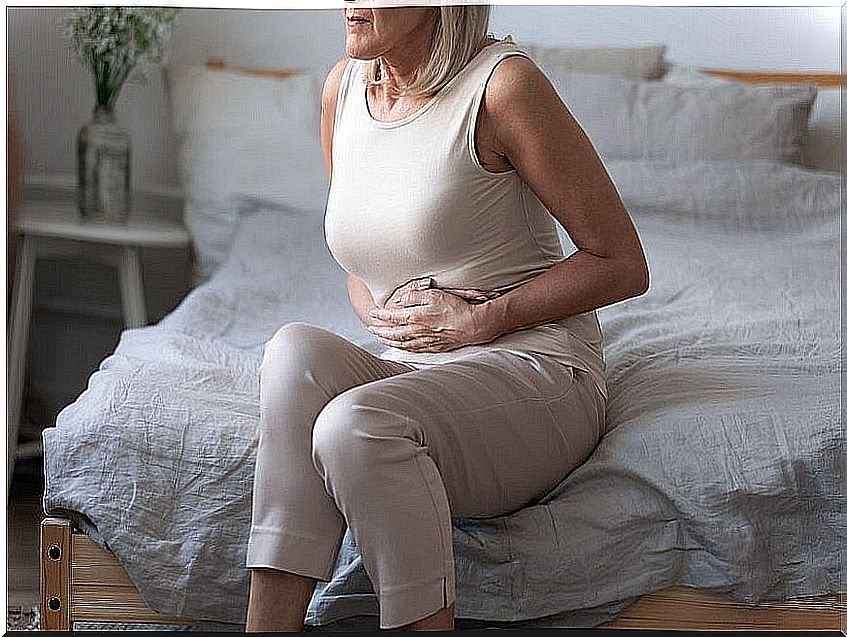 Why do women have a swollen belly at menopause?